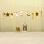 Lunar Serenity Decor Set - Eid Decor Set with gold star and moon banner, medium lantern, and Eid Mubarak scented candle for festive home decor.