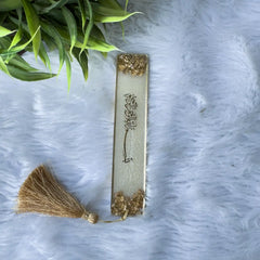 Custom Islamic bookmark with Bismillah calligraphy in gold flakes and tassel, crafted for sacred texts and wedding favor gifting.