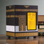 Decorative clock with intricate designs and digital display on a wooden surface.