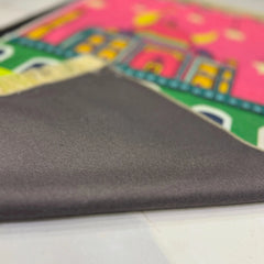 Close-up of the Little Hajj Explorer Mat - Kids Prayer Mat showing soft, non-slip backing. Durable and easy to clean for everyday use.