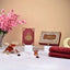 Premium Kid's Maroon Quran Gift Set with decorative box, prayer mat, and tasbeeh, ideal for Eid and Bismillah ceremonies.