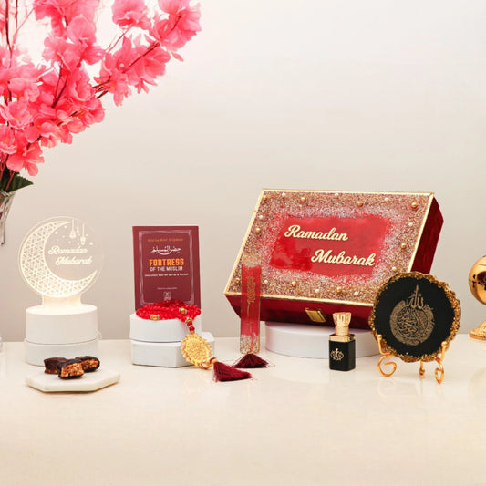 Mubarak Moments Ramadan Gift Box with Ayatul Kursi frame, tasbeeh, ittar, and prayer essentials in red velvet box. Ideal Ramadan gift hamper.