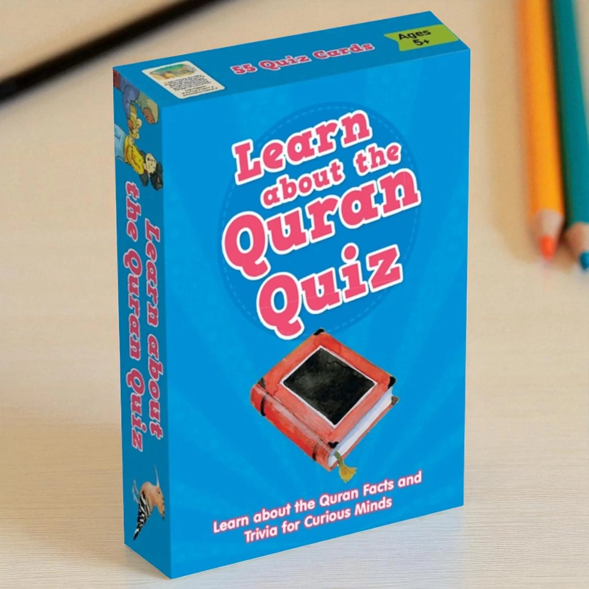 Blue box of 'Learn about the Quran Quiz' with colorful pencils in the background