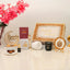 Noor Al-Ramadan Gift Box with Ramadan Mubarak gold box, tasbeeh, perfume, candle, and scarf, perfect for festive gifting.