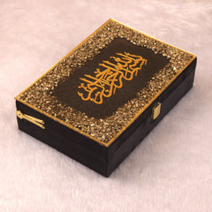 Decorative box with gold embellishments and Arabic calligraphy