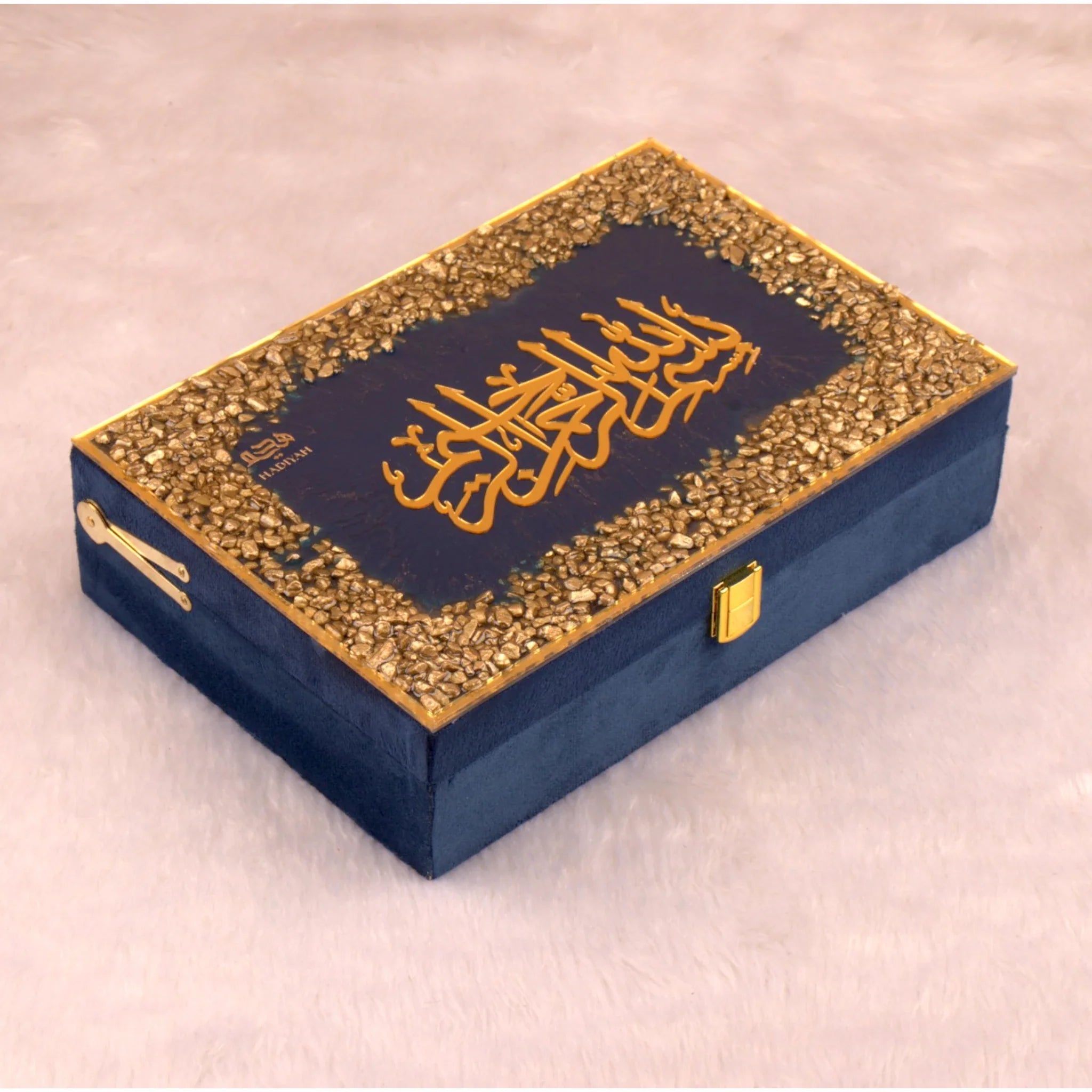 Blue decorative box with gold calligraphy