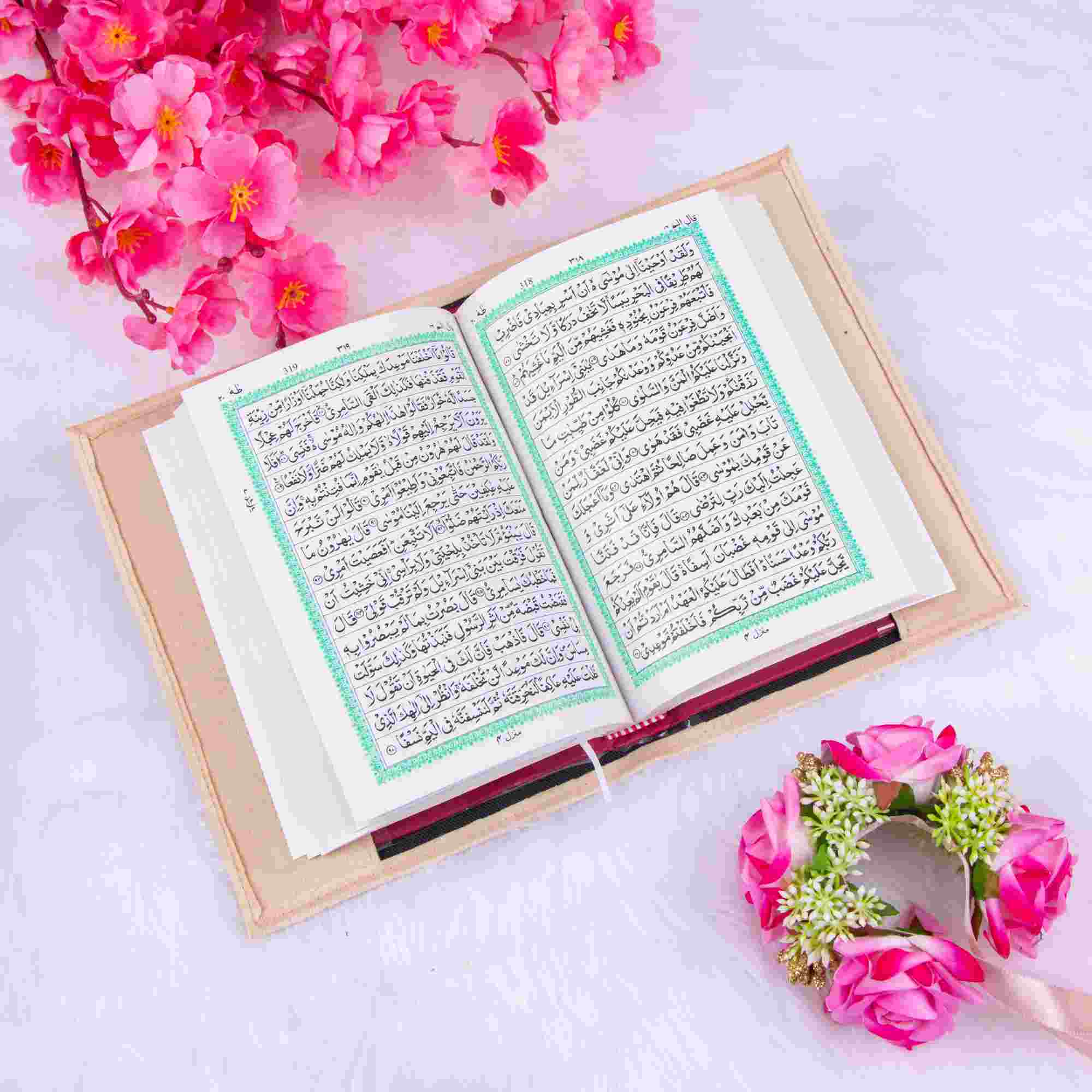 Open Arabic Velvet Covered Quran in beige with floral decor on white fur. Ideal for gifting and personal prayer use.