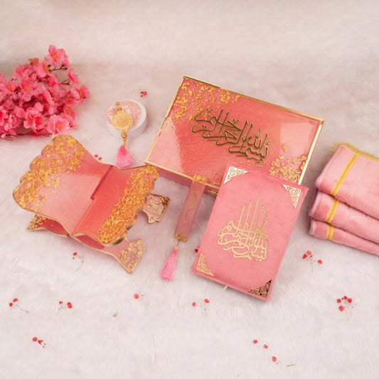 Premium Sawab-e-Jariya bridal hamper featuring pink Quran, gold-detailed box, tasbih, and prayer accessories. Elegant Islamic wedding gift set.
