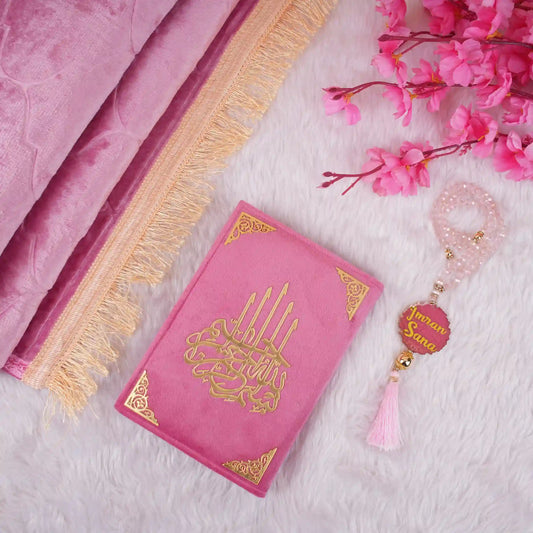 Custom Pink Salah Hamper with velvet Quran, pink Janamaz, and crystal Tasbeeh featuring personalized name tag. Ideal for spiritual gifting.