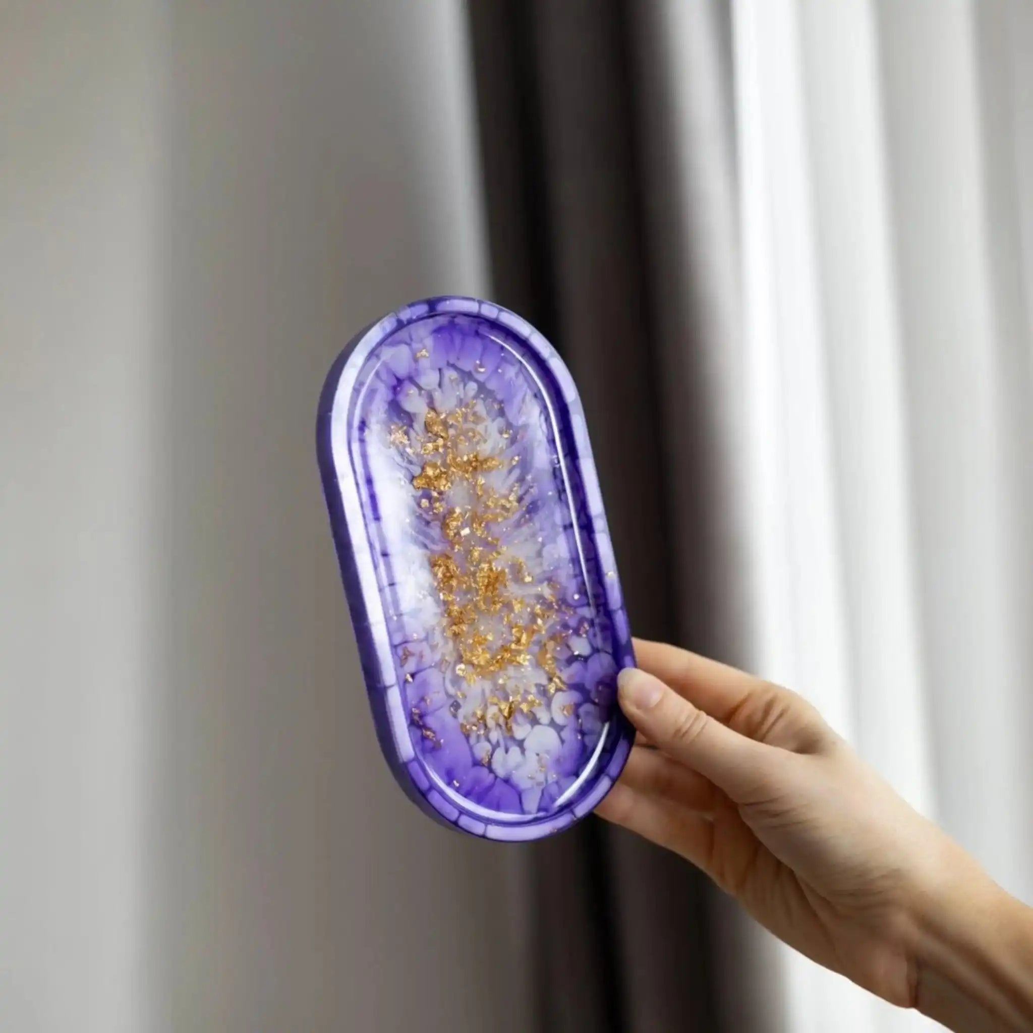 Decorative resin trinket tray ideal for makeup or home décor use.