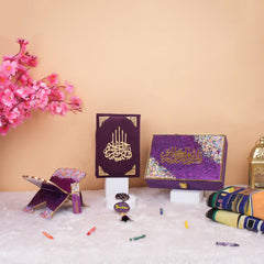 Purple Kids Glitter Collection Ibadah Gift Set | Hadiyah Gifting featuring a glittery Quran, prayer mat, tasbih, and wooden rehal in a decorative box.