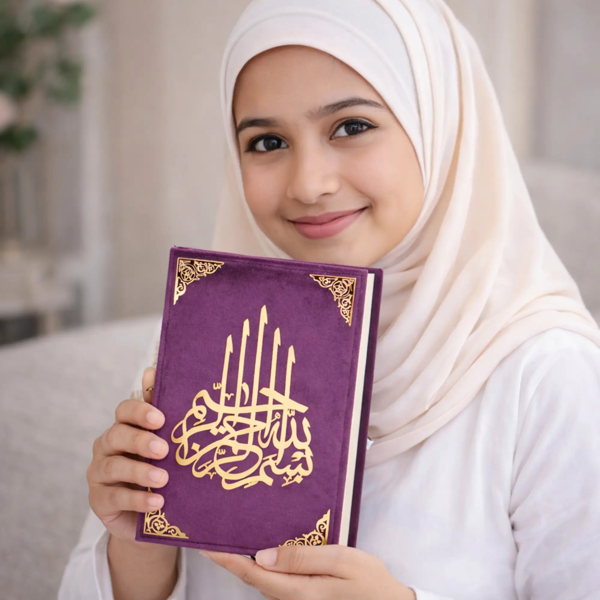 Woman holding Velvet Quran Translation in purple with golden Arabic calligraphy, ideal Ramadan or wedding gift in elegant handmade design.