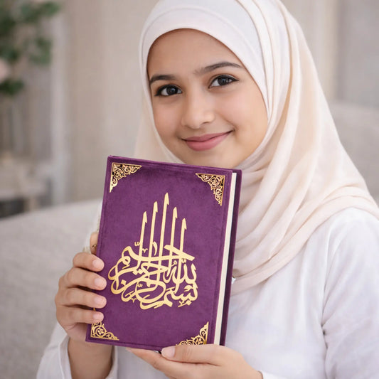 Woman holding Velvet Quran Translation in purple with golden Arabic calligraphy, ideal Ramadan or wedding gift in elegant handmade design.