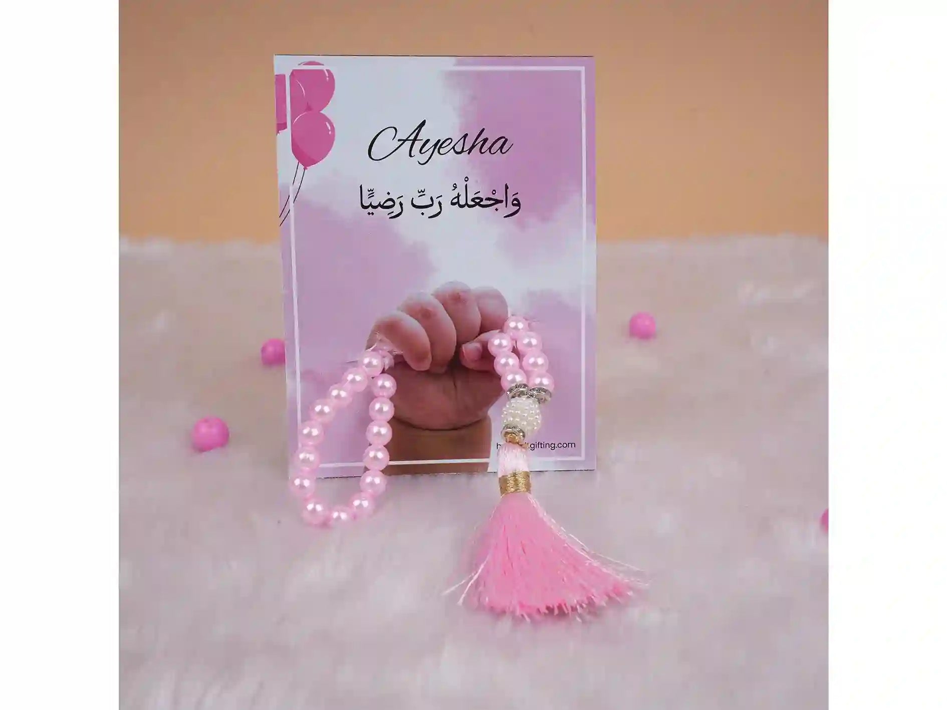 Pink Little Hands Tasbeeh Keepsake with name 'Ayesha' on a custom card, a charming Aqiqah favor from the Kids Collection.