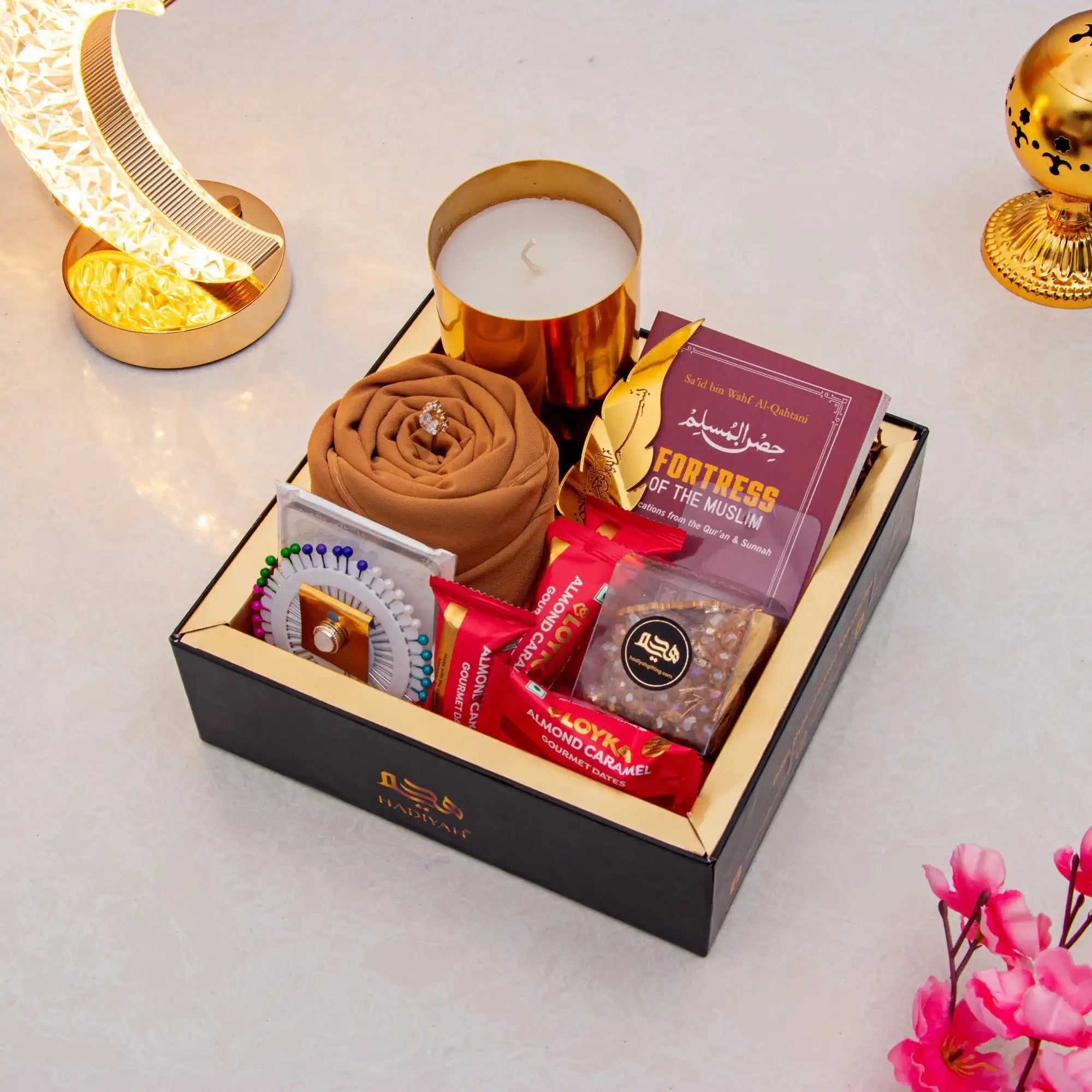 Rahmat Hamper - Spiritual Gift Set featuring prayer essentials, Islamic book, dates, and gourmet treats in a luxury black box for Ramadan gifting.