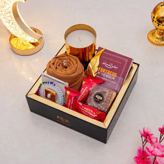 Rahmat Hamper - Spiritual Gift Set featuring prayer essentials, Islamic book, dates, and gourmet treats in a luxury black box for Ramadan gifting.