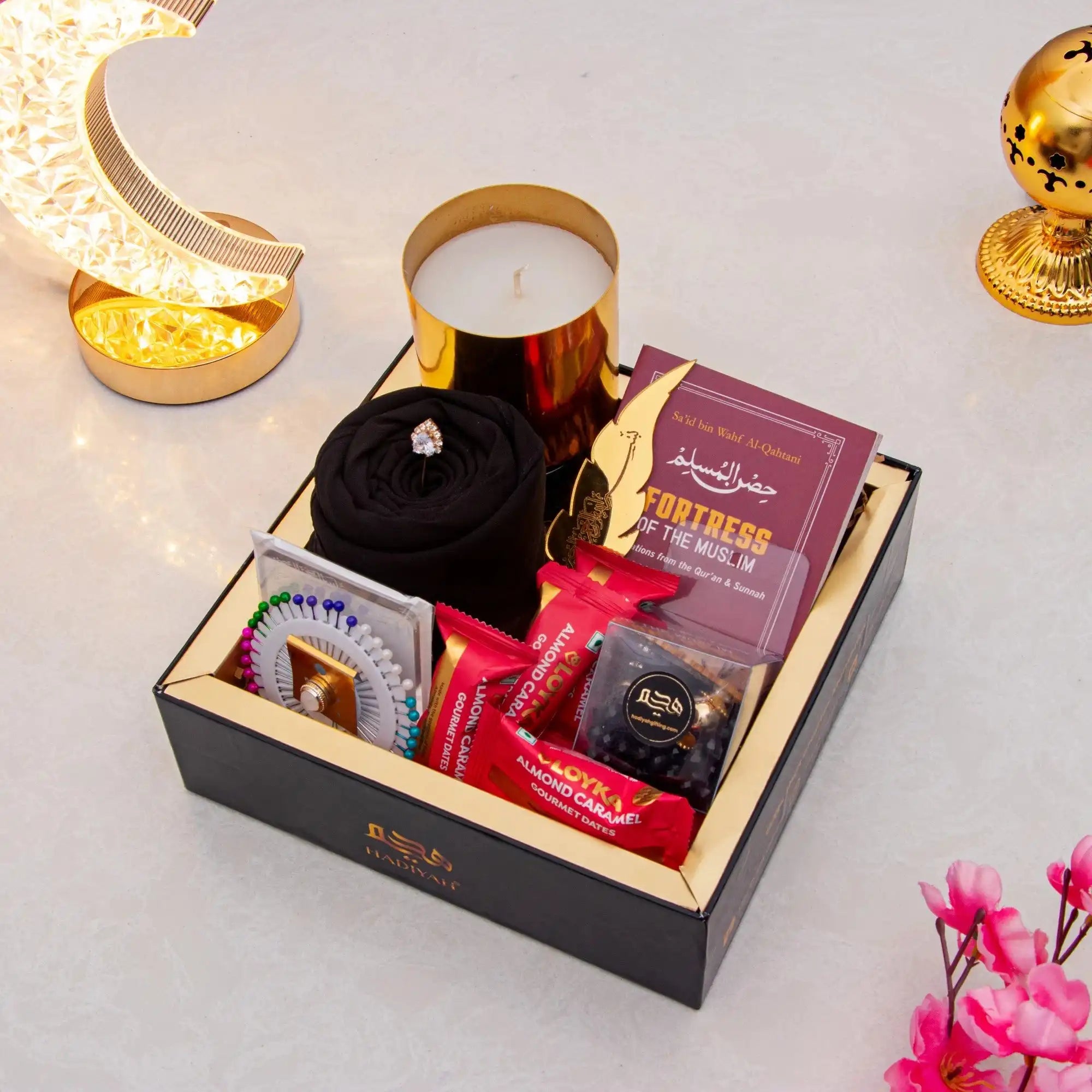 Rahmat Hamper - Spiritual Gift Set featuring prayer essentials, premium dates, sweets, and a candle in a luxury black box for Ramadan gifting.