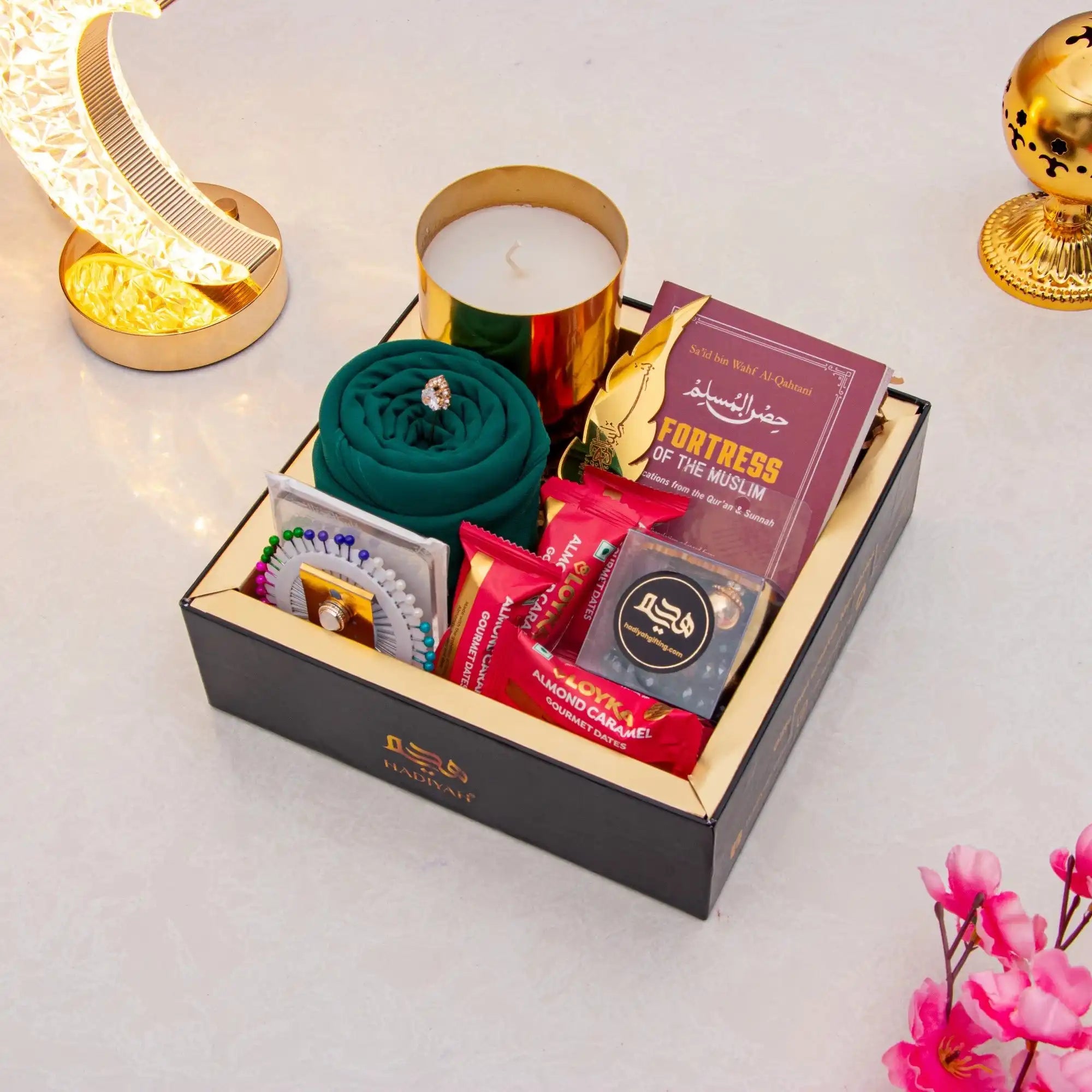 Rahmat Hamper - Spiritual Gift Set featuring prayer essentials, Islamic book, candle, tasbih, and gourmet treats in a luxury black box.