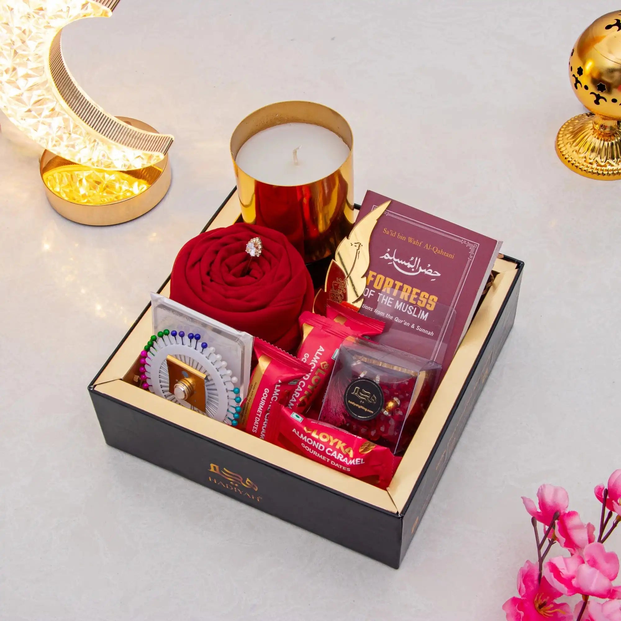 Rahmat Hamper - Spiritual Gift Set featuring prayer essentials, Islamic book, gourmet treats, and candle in elegant black box for Ramadan gifting.