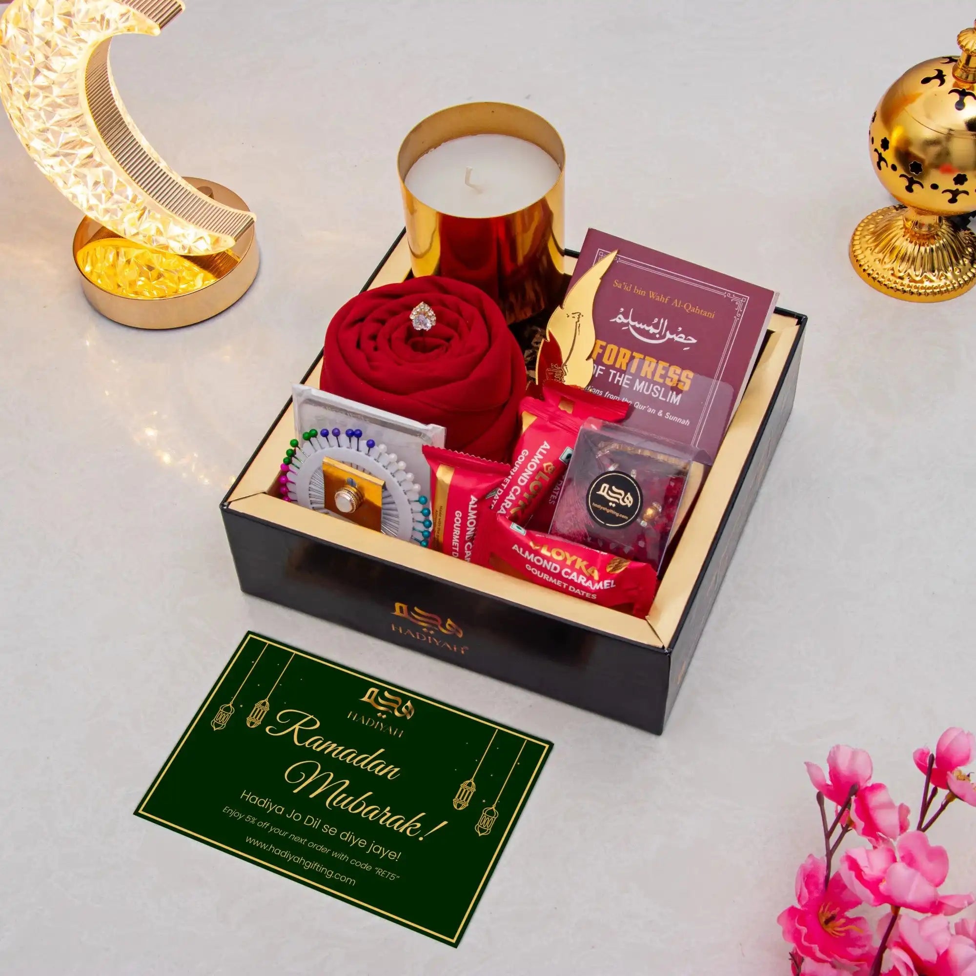 Rahmat Hamper - Spiritual Gift Set featuring prayer essentials, gourmet treats, and Islamic literature in a luxury black box for Ramadan gifting.