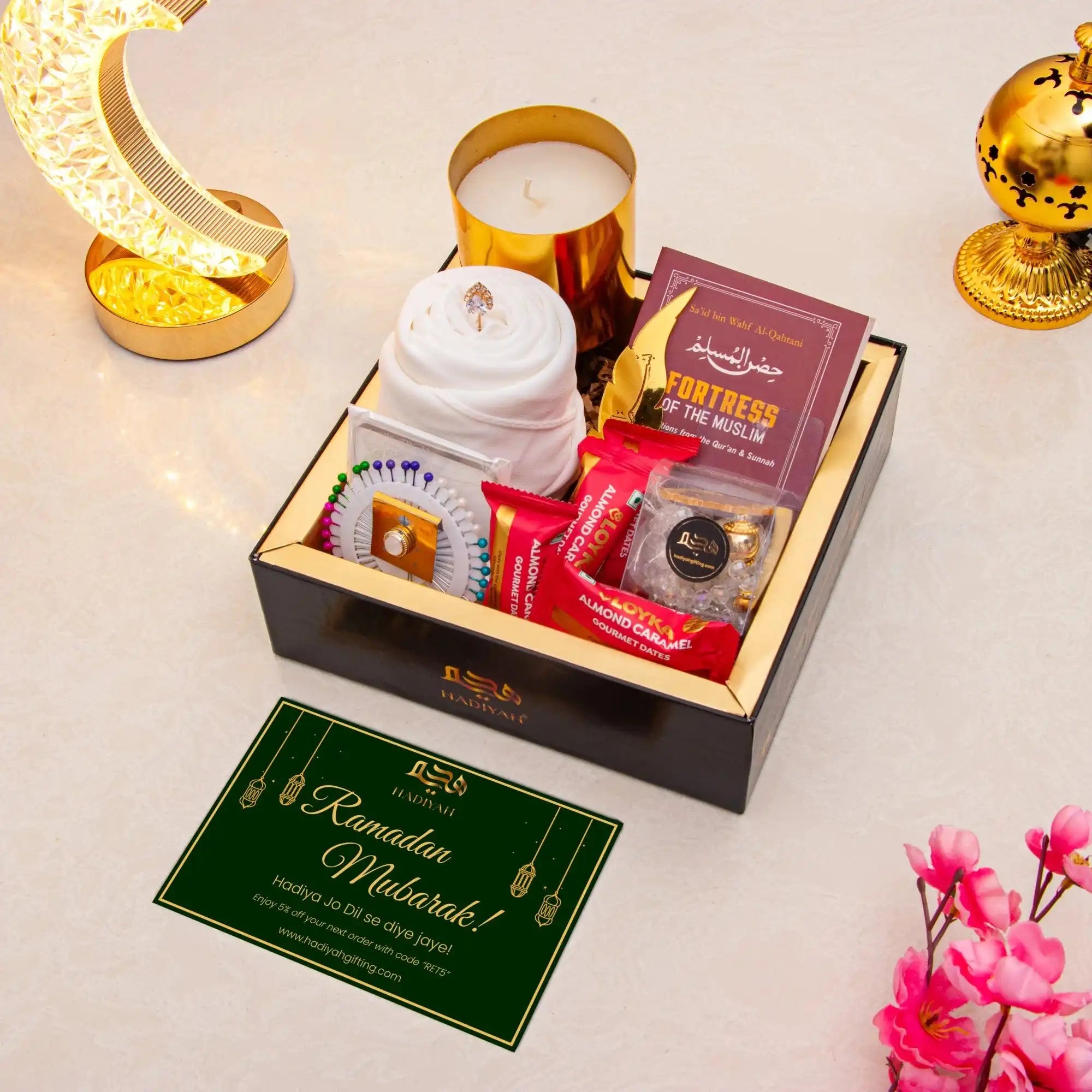 Rahmat Hamper - Spiritual Gift Set featuring prayer essentials, gourmet treats, and Islamic book in a luxury black box for Ramadan gifting.