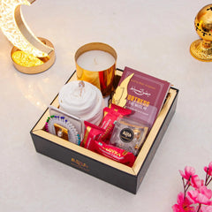 Rahmat Hamper - Spiritual Gift Set featuring prayer essentials, Islamic book, scented candle, and gourmet treats in a luxury black box.