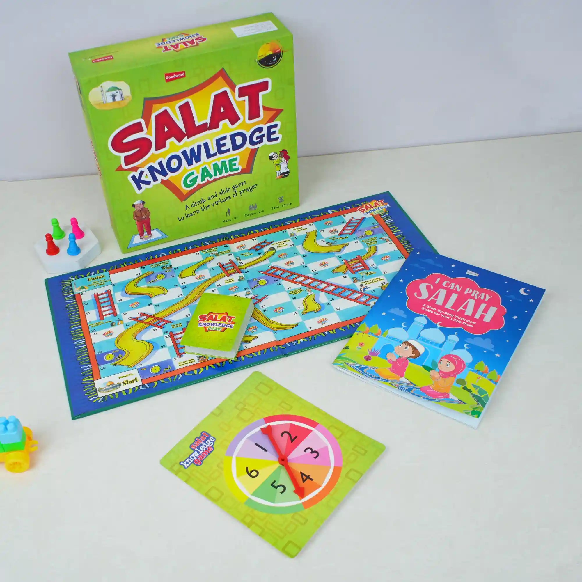 Board game set with 'Salat Knowledge Game' on a white surface