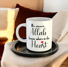 Allah Knows What's in the Heart Mug with inspirational quote in black script and red heart, ceramic drinkware for home decor and gifting.