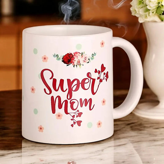 Super Mom Mug Gift with floral design and red text, perfect for Mother's Day. Personalized ceramic drinkware for home and kitchen use.