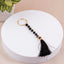 Tawaaf Tasbeeh Beads Pack of 2 with black glossy beads and gold ring, ideal for dhikr and Hajj & Umrah rituals. Features smooth-gliding design.