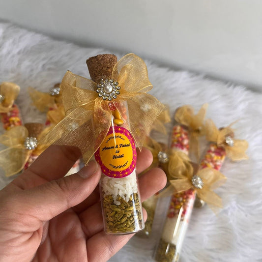 Customized Shahi Mix Sounf Bottle with golden ribbon and jeweled embellishment, ideal for Nikah wedding favors and celebration gifts.