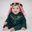 Baby boy wearing traditional green thobe with gold embroidery and tassel