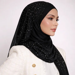 Black studded hijab styled on a woman, showcasing smooth chiffon texture and premium finish for modest fashion in apparel accessories.