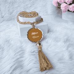 Personalised crystal Tasbeeh with golden tassel and engraved name tag from the Golden Salah Combo Hamper. Custom Islamic gift.