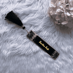 Black and gold personalized bookmark with 'Farida Syf' name and tassel, elegant Islamic design for wedding favors or gifts for women.