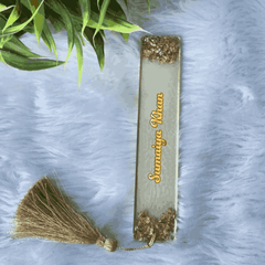 Elegant Islamic bookmark in white and gold resin with name 'Sumaiya Khan' and gold tassel, ideal for personalized wedding favors or gifts.