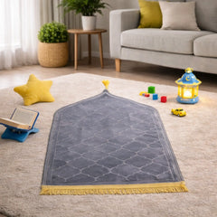 Gray Kids Dome Janamaz - Kids Dome Prayer Rug placed in a playroom with toys and Islamic decor, perfect for introducing children to salah.