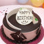 Chocolate Birthday Cake - Moist & Rich with dark chocolate glaze, white chocolate decor, and 'Happy Birthday' topper. Ideal for celebrations.
