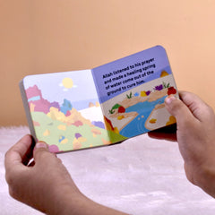 Inside page of Quran Stories Board Book showing colorful illustrations and simple Islamic story text, ideal for toddler engagement and learning.