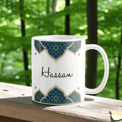 Personalized Umrah Mubarak Mug with custom name 'Hassan' in elegant script, 350ml ceramic drinkware for Islamic gifting and home decor.