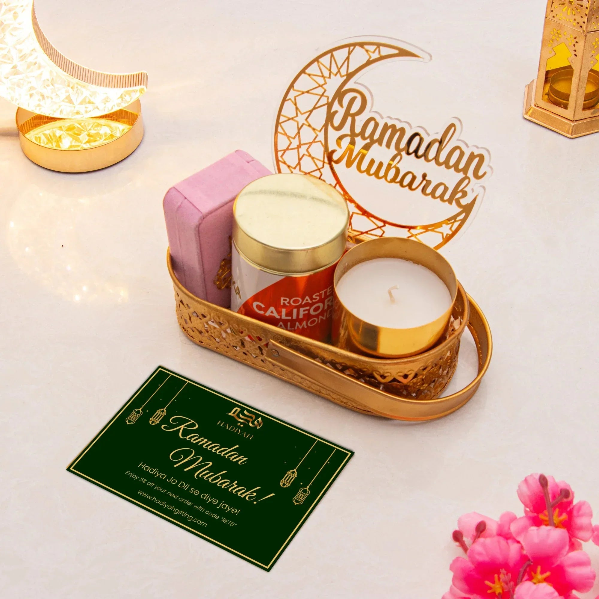 Elegant Ramadan Mubarak decor tray with candle and festive treats
