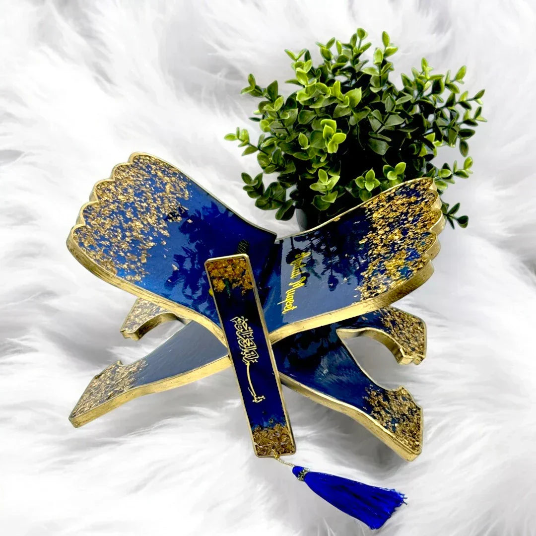 Elegant blue and gold Quran book stand with matching bookmark.