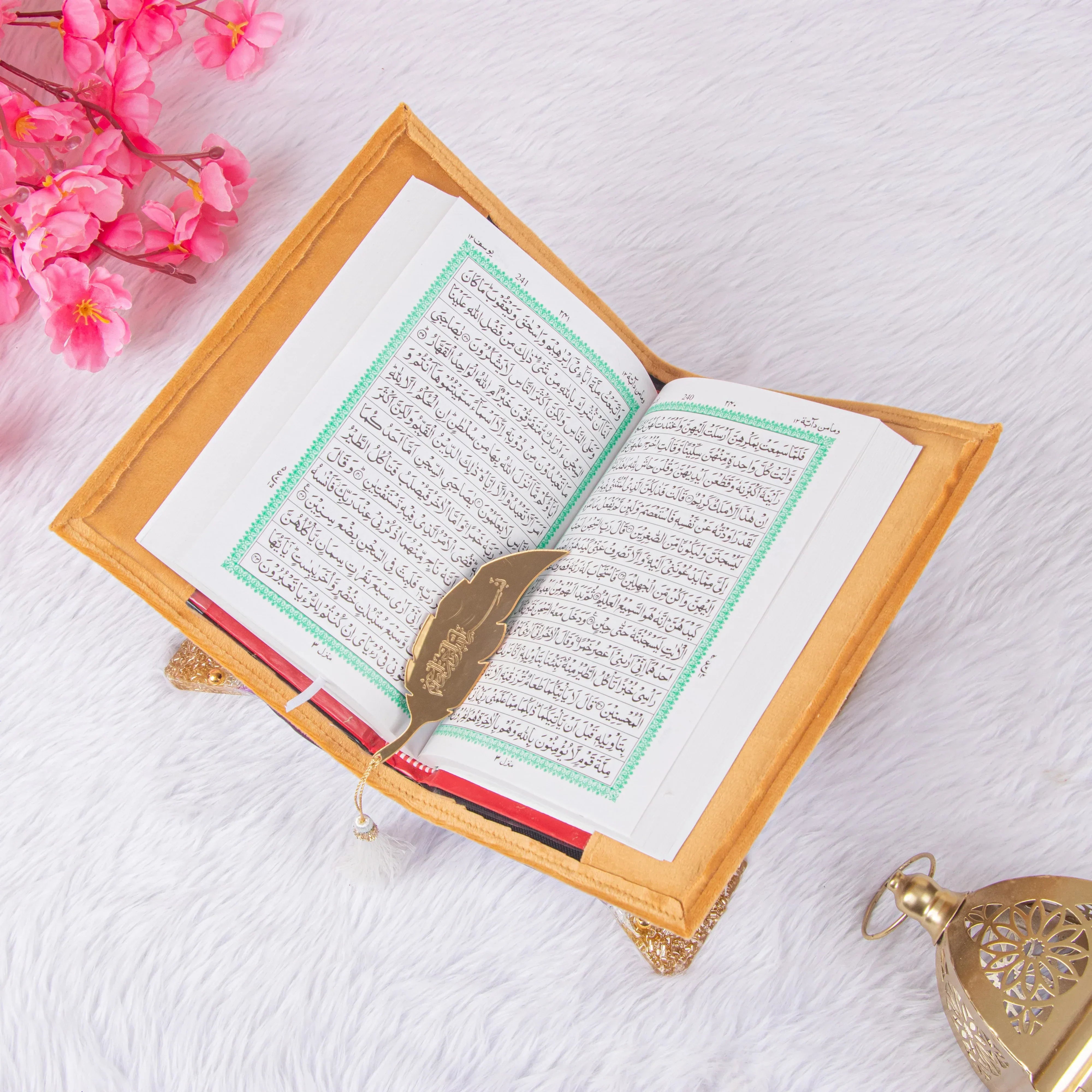 Elegant Quran gift set with golden bookmark and decorative lantern