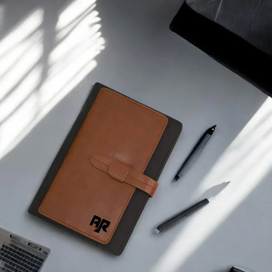 Elegant leather-bound dua book with pen on modern workspace desk.