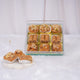 Baklava assortment in transparent gift box with nuts topping