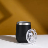 Custom stainless tumbler with clear lid, matte black finish. Premium personalised tumbler for beverages, rust-resistant and insulated.