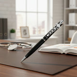 Black pen with decorative elements on a white background