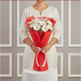 10 White Gerbera Flowers Bouquet shown from a different angle
