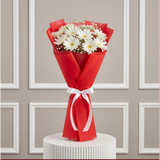 10 White Gerbera Flowers Bouquet arranged in packaging, close-up