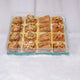 Tray of assorted baklava with nuts and syrup